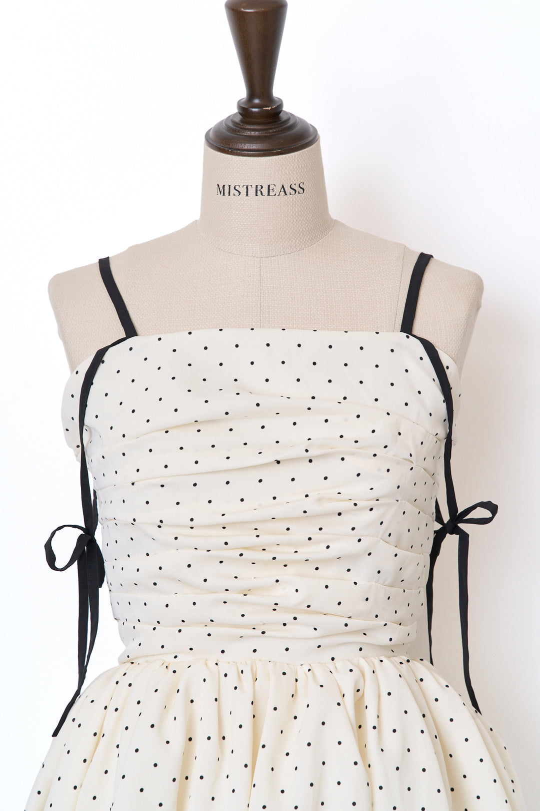 再入荷：7月中旬配送】Polka Dot Peplum Ribbon Top - MISTREASS